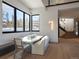 Sun-drenched dining area features large windows and a built-in bench at 132 N Gold Flake Ter, Breckenridge, CO 80424