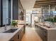 Modern kitchen featuring stainless steel appliances, wood cabinets, and marble countertops at 132 N Gold Flake Ter, Breckenridge, CO 80424