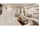Basement living area featuring a comfortable seating area at 3765 W 88Th Ct, Westminster, CO 80031