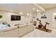 Finished basement including cozy seating area and gym equipment at 3765 W 88Th Ct, Westminster, CO 80031
