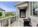 Cozy front porch with modern furniture and stylish stone accents, creating an inviting entryway at 3765 W 88Th Ct, Westminster, CO 80031
