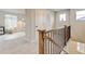Spacious hallway with natural light and views of a playroom at 3765 W 88Th Ct, Westminster, CO 80031