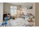 Bright playroom with soft carpet, storage and engaging toys at 3765 W 88Th Ct, Westminster, CO 80031