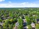 Spacious neighborhood view with lush, mature trees and street at 3726 E Nichols Ave, Centennial, CO 80122