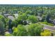 Aerial view of a neighborhood featuring mature trees at 3726 E Nichols Ave, Centennial, CO 80122