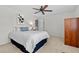 Bright bedroom with a ceiling fan, artwork, and light-colored walls at 3726 E Nichols Ave, Centennial, CO 80122