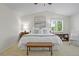 Serene bedroom with vaulted ceiling, comfortable bedding, and a bright window view at 3726 E Nichols Ave, Centennial, CO 80122