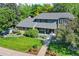 Charming two-story home featuring a well-manicured lawn and inviting front porch at 3726 E Nichols Ave, Centennial, CO 80122