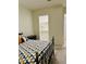 Bedroom featuring a bed, closet, and neutral decor at 2876 W 53Rd Ave # 305, Denver, CO 80221