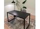 Home office space with desk, rug and stylish lamp perfect for remote work or study at 2876 W 53Rd Ave # 305, Denver, CO 80221
