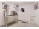 Convenient pet washing station with stainless steel tub, spray nozzle, and wall-mounted decor provides easy pet cleaning at 2876 W 53Rd Ave # 305, Denver, CO 80221