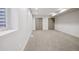 Unfinished basement featuring neutral carpet, white walls, and recessed lighting at 1386 Zenobia St, Denver, CO 80204