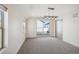 Spacious bedroom with natural light, carpet and a sliding glass door to a deck at 1386 Zenobia St, Denver, CO 80204