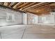 Unfinished basement with concrete floor and studded walls, ready to be transformed at 13920 Hanging Lake St, Parker, CO 80138