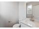 Elegant half-bathroom with marble countertop and modern fixtures at 13920 Hanging Lake St, Parker, CO 80138