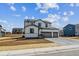 Beautiful home with a three-car garage, spacious driveway, and professional landscaping at 13920 Hanging Lake St, Parker, CO 80138