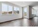 Living room with large windows and a view of the neighborhood at 13920 Hanging Lake St, Parker, CO 80138
