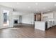 Bright living space with open kitchen and fireplace at 13920 Hanging Lake St, Parker, CO 80138