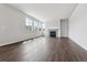 Spacious living room with lots of natural light and a fireplace at 13920 Hanging Lake St, Parker, CO 80138