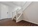 Entry way with staircase and wood floors at 13920 Hanging Lake St, Parker, CO 80138
