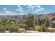 Picturesque golf course nestled in the Rocky Mountains offering stunning natural views at 12749 W Glasgow Pl, Littleton, CO 80127