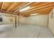 This unfinished basement offers a blank canvas and lots of space for storage and future renovations at 9930 W Progress Pl, Littleton, CO 80123