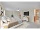 Spacious main bedroom with ceiling fan and ensuite bathroom at 9930 W Progress Pl, Littleton, CO 80123
