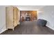 Inviting living area featuring a brick fireplace and wood-look tile flooring at 1301 S Yampa Ct, Aurora, CO 80017