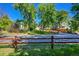 Ranch style home with mature trees at 7115 Geneva Ct, Lakewood, CO 80214