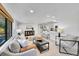 Comfortable living room featuring a gray sofa and stylish coffee table at 7115 Geneva Ct, Lakewood, CO 80214