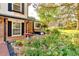 Inviting front yard with colorful flowers and lush landscaping at 7681 S Jellison St, Littleton, CO 80127