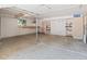 Large garage space with built-in shelving and ample storage at 7681 S Jellison St, Littleton, CO 80127
