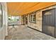 Cozy sun room with stone floors and wood ceiling at 7681 S Jellison St, Littleton, CO 80127
