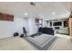 Spacious finished basement offers a living area and workout space, great for entertaining at 4840 Depew St, Denver, CO 80212