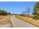 Concrete walking path with mountain views at 4840 Depew St, Denver, CO 80212