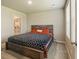Comfortable bedroom with natural light and modern decor with en-suite bath at 719 S Hoover Ave, Fort Lupton, CO 80621