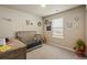 Cozy bedroom with playful decor and lots of natural light at 719 S Hoover Ave, Fort Lupton, CO 80621
