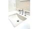 Close-up of a bathroom sink with elegant chrome faucet on a white vanity at 1731 S Ogden St, Denver, CO 80210