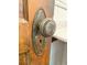 Vintage door knob on a wood door at 1731 S Ogden St, Denver, CO 80210
