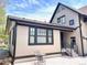 Exterior view of home featuring an outdoor patio with table and seating at 1731 S Ogden St, Denver, CO 80210