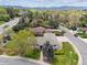 Lovely single-Gathering home boasting a spacious yard, mature trees, and mountain views in the distance at 3229 Swadley St, Wheat Ridge, CO 80033