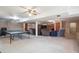 Finished basement with carpet, recessed lights, and entertainment and game areas at 3229 Swadley St, Wheat Ridge, CO 80033