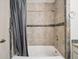 Bathroom with a shower and bathtub combination, perfect for relaxation and functionality at 3229 Swadley St, Wheat Ridge, CO 80033