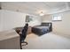 Neutral bedroom with carpet, two windows and a ceiling fan at 3229 Swadley St, Wheat Ridge, CO 80033