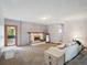 Cozy living room with a fireplace and comfortable seating, offering a relaxing atmosphere at 3229 Swadley St, Wheat Ridge, CO 80033