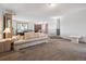 Bright and airy living room showcasing comfortable seating and a seamless transition to other areas at 3229 Swadley St, Wheat Ridge, CO 80033