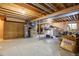 Unfinished basement area with a dog kennel at 35877 Elkridge Run, Elizabeth, CO 80107