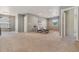 Bright upstairs loft area featuring neutral colors, carpet, and recessed lighting at 19067 W 57Th Dr, Golden, CO 80403