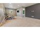 Upstairs bonus room featuring neutral colors, carpet, and plenty of natural light at 19067 W 57Th Dr, Golden, CO 80403