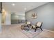 Bright bonus room with comfortable seating area and view of the railing at 19067 W 57Th Dr, Golden, CO 80403